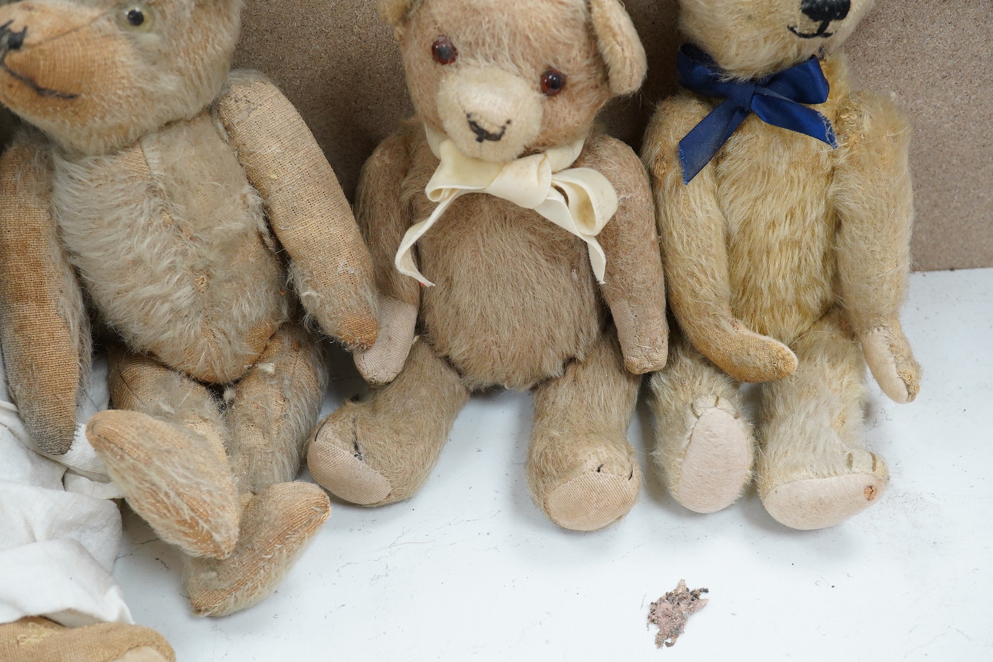 Four bears with restoration, hair loss, one English and three German, c.1930's